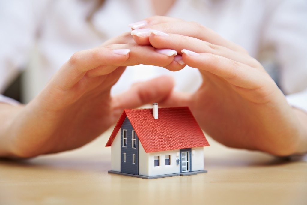 Woman protecting her home concept