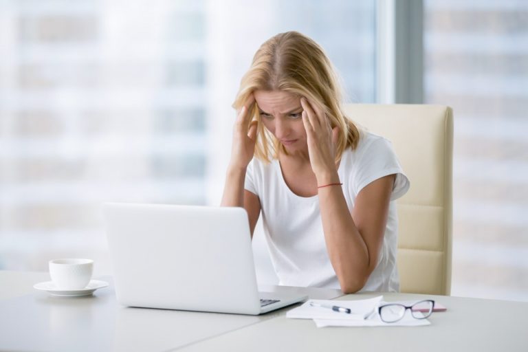 sad and frustrated employee at work