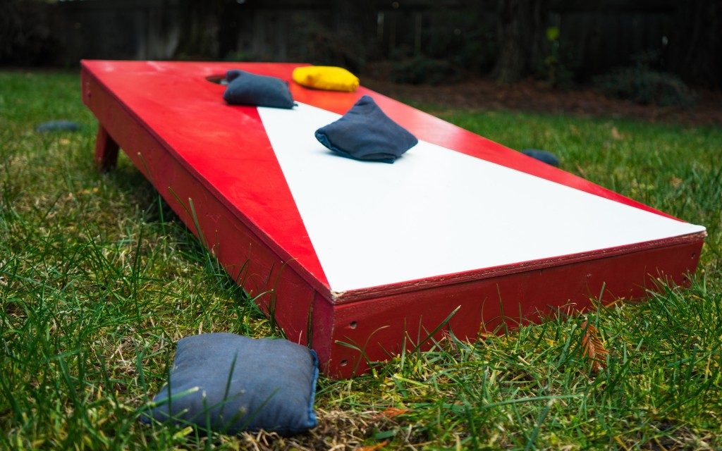 Cornhole toss game board