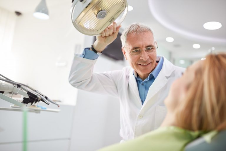 Dentist with patient
