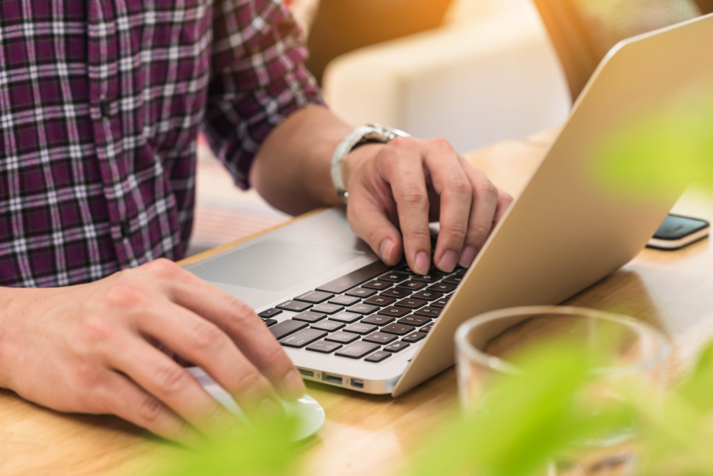 man using the laptop