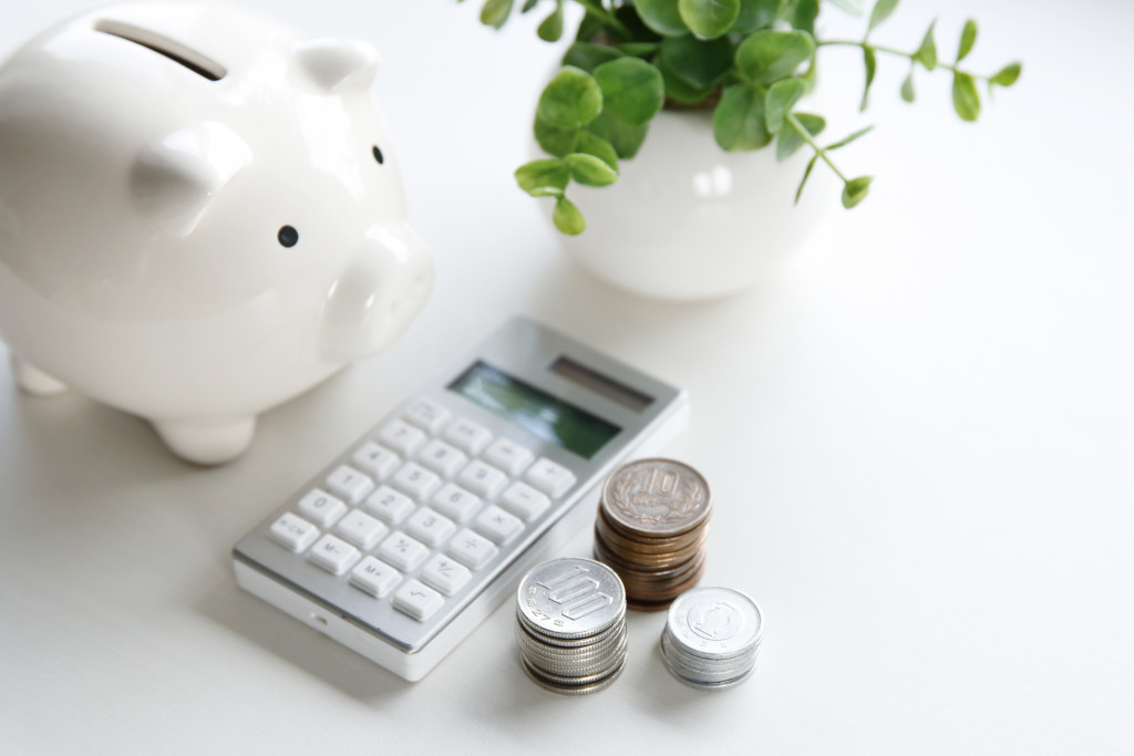 money box and electronic calculator