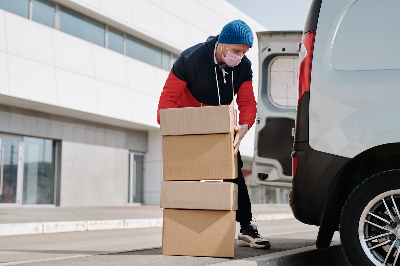 delivery man wearing a mask