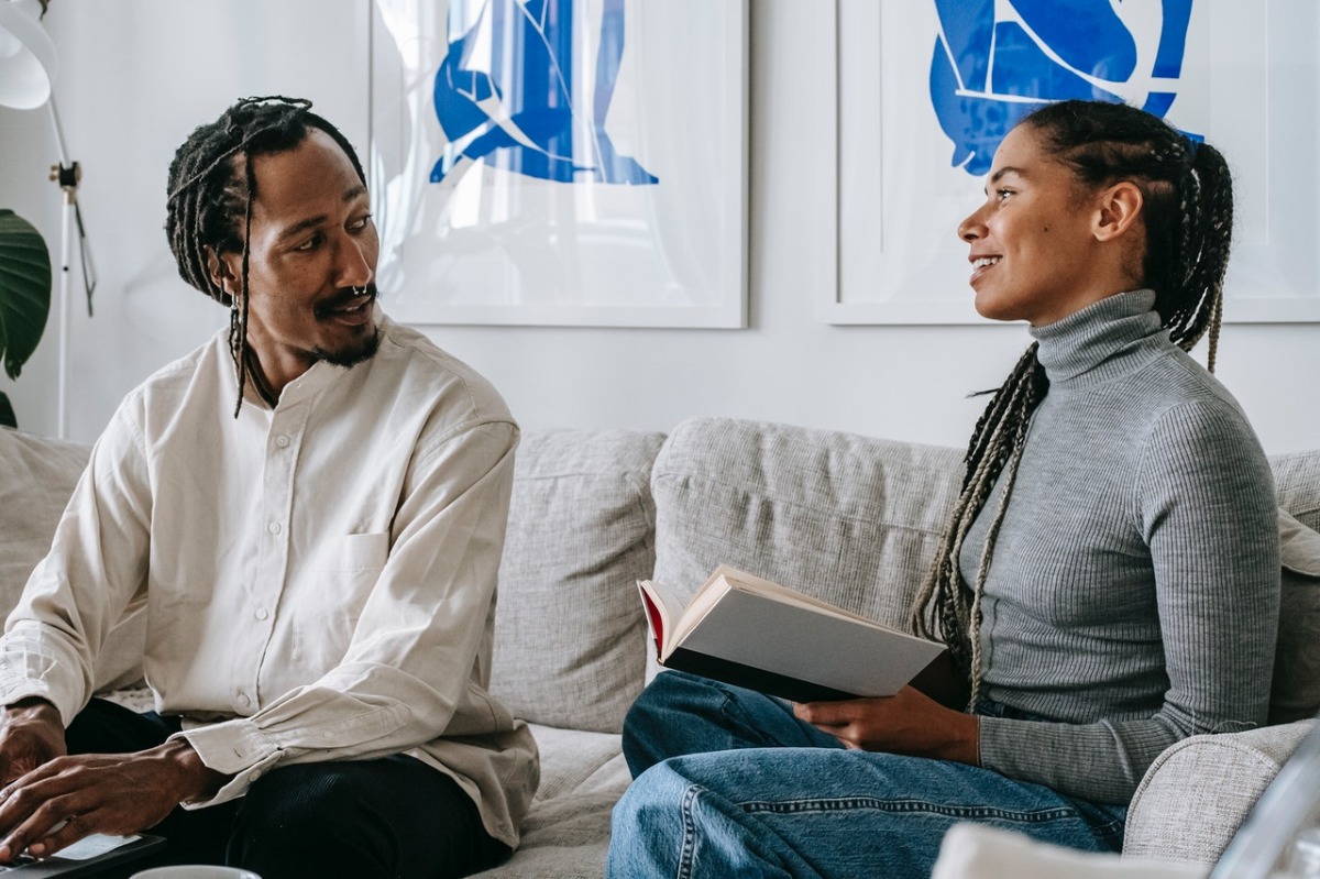 people talking on a couch