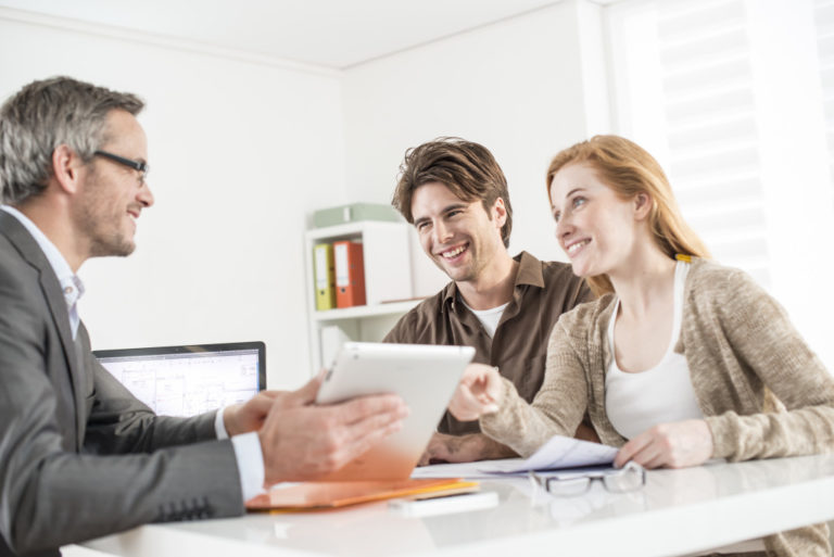 couple talking to agent