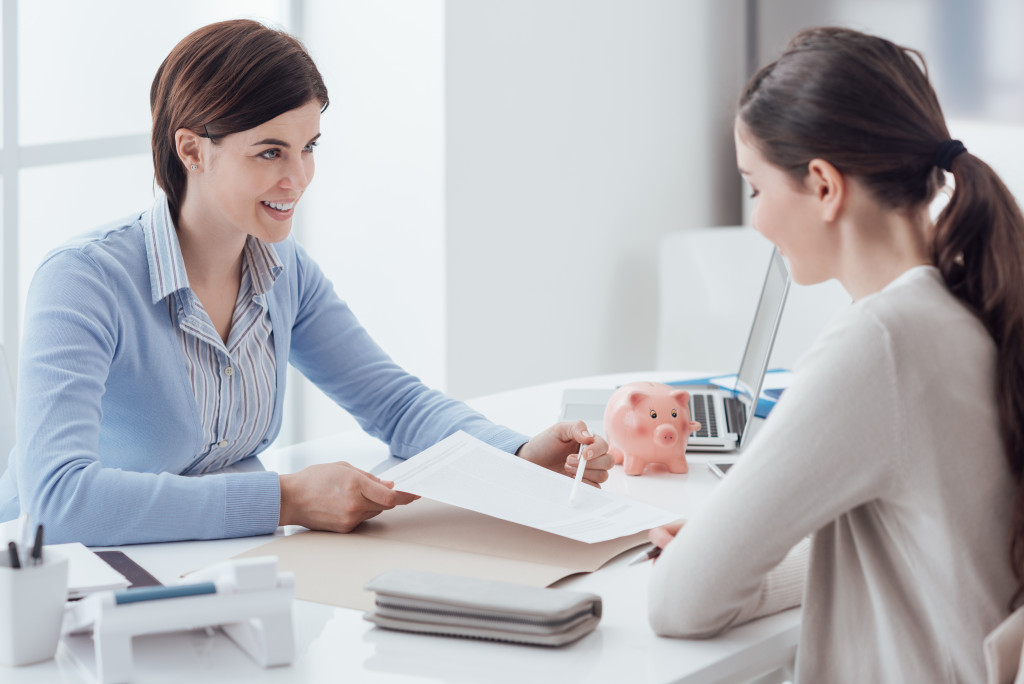 financial advisor talking to woman