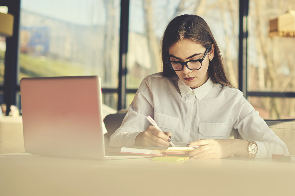 woman writing something