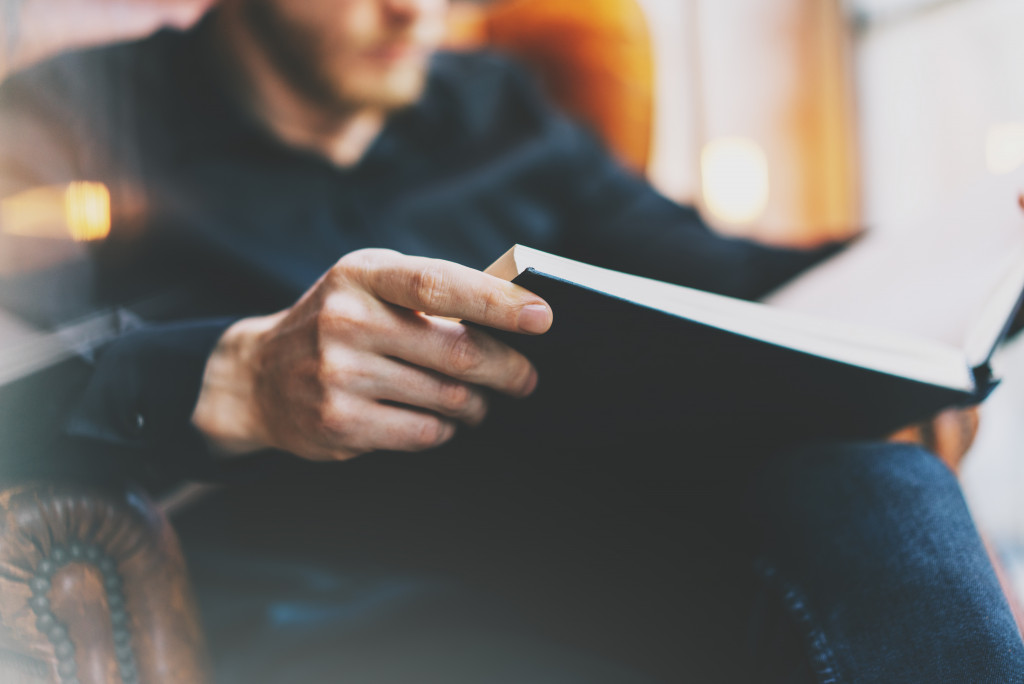 man reading a book