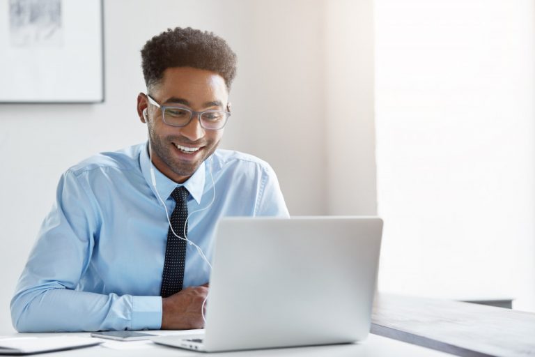 business owner looking at his laptop