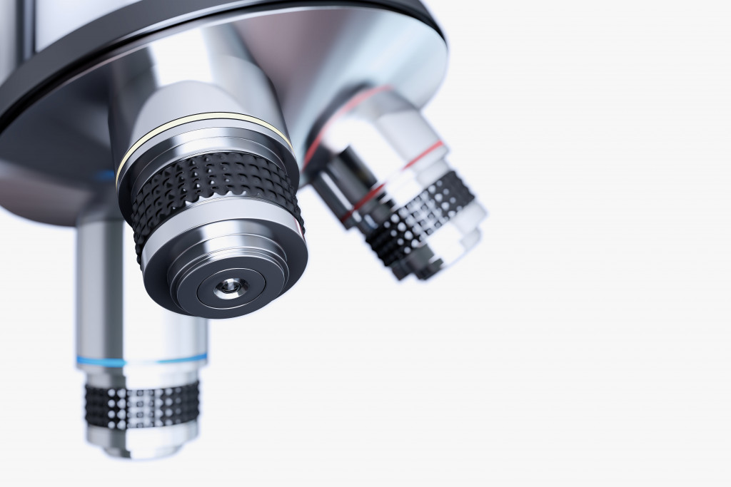 A close look into a microscope lenses
