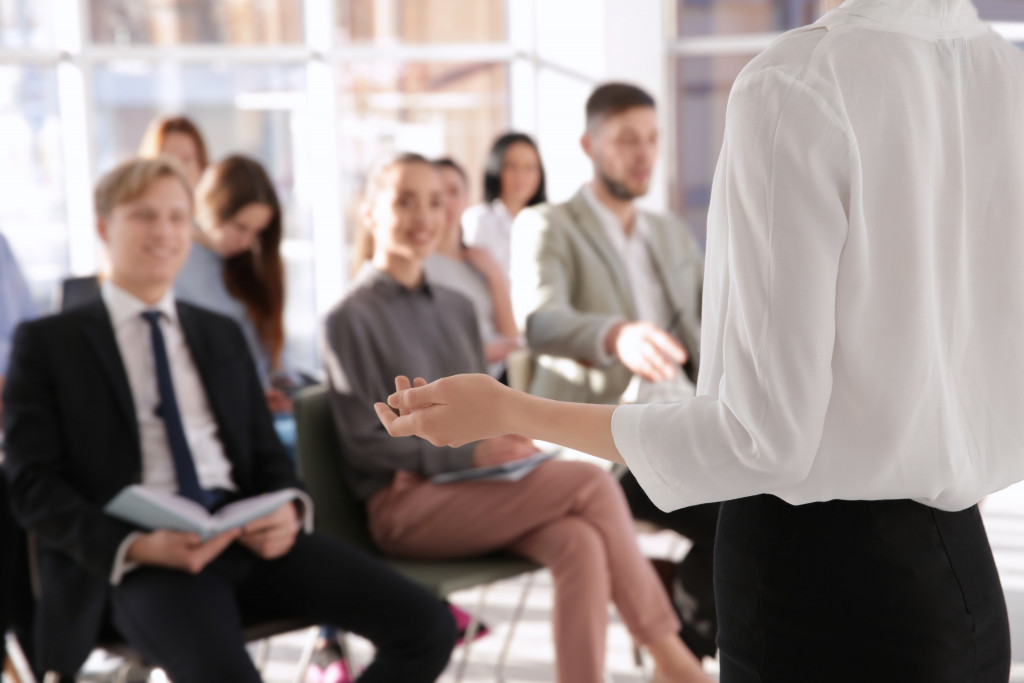 business mentor giving presentation to employees