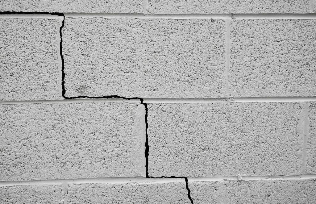 cinder block building with crack