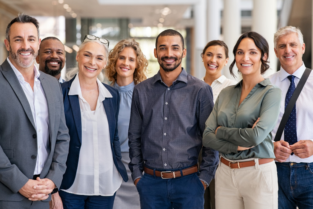 successful group of business people together looking at camera