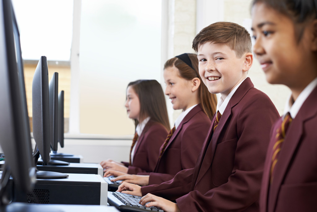 Students using computers while studying