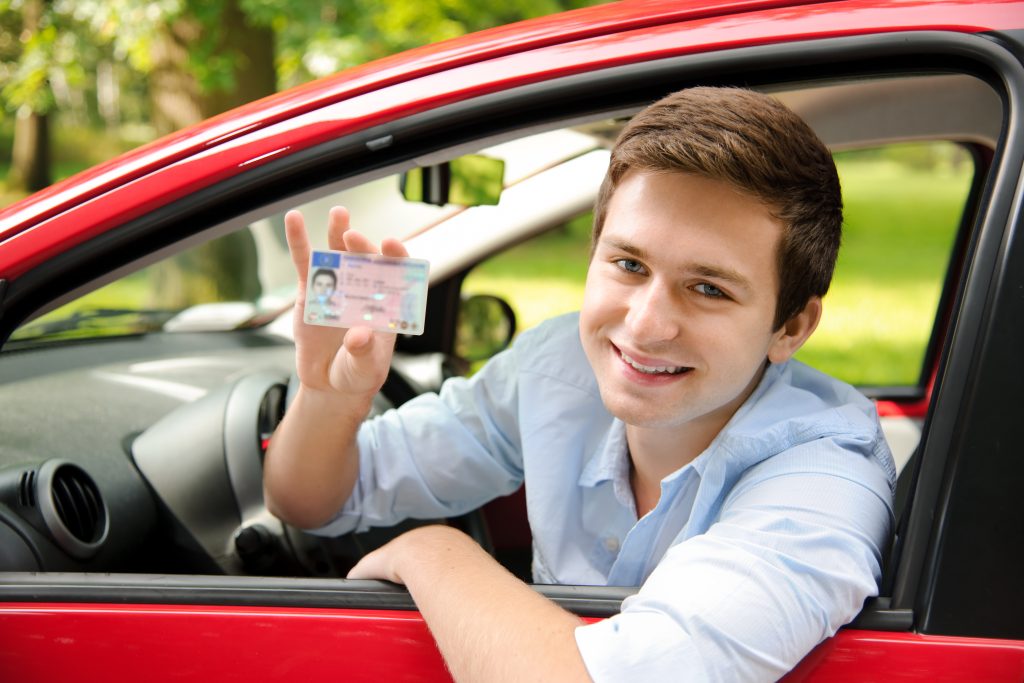 man with his driver's license