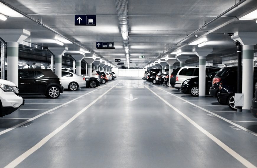 A commercial parking garage with cars