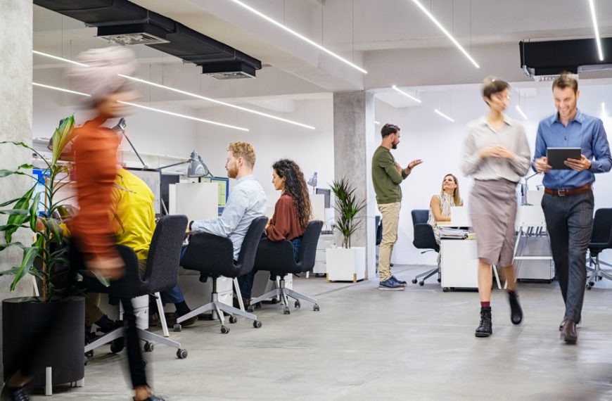 Busy coworking open space with staff