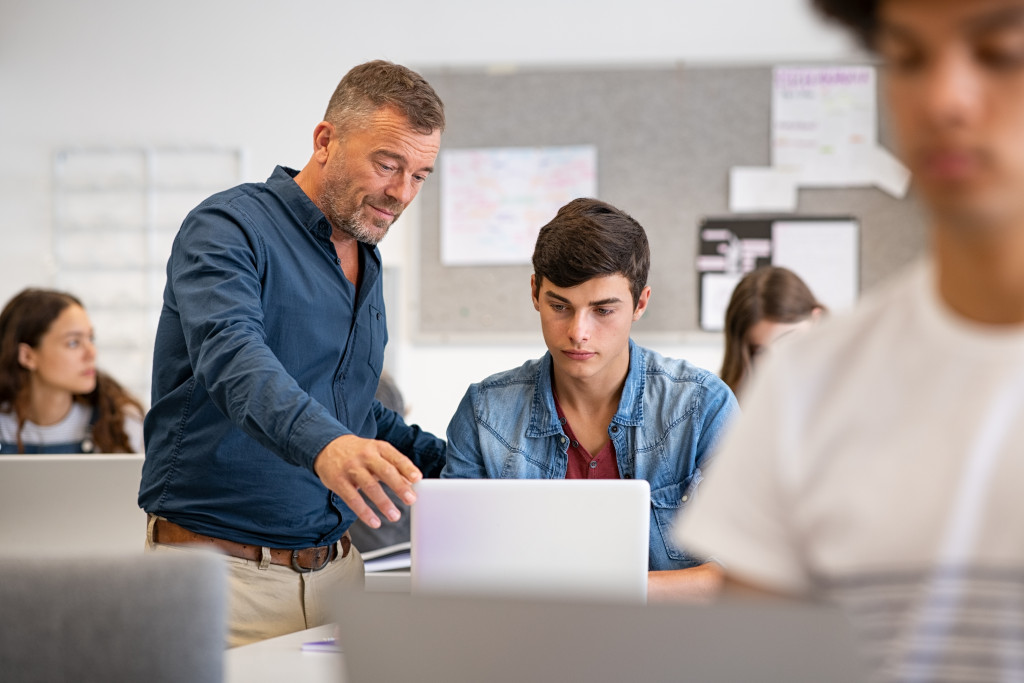 teacher and young student