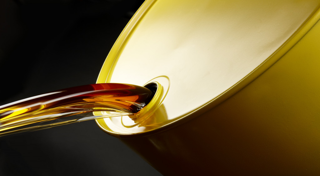 An image of oil pouring out from its barrel