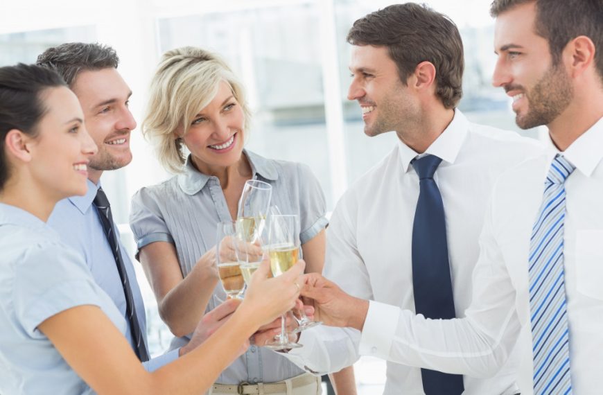 employees celebrating success in the workplace