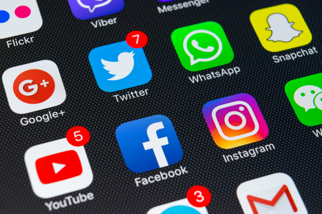 Social media app icons on phone screen