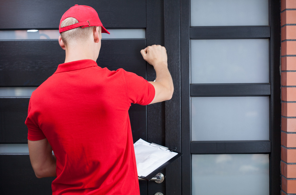 document delivery with a man in red knocking